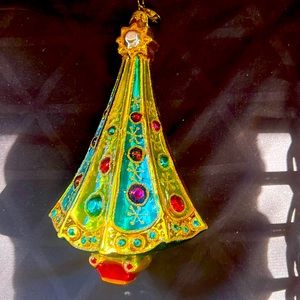 Pre-owned Christopher Radko Christmas ornament with stand. Excellent condition!